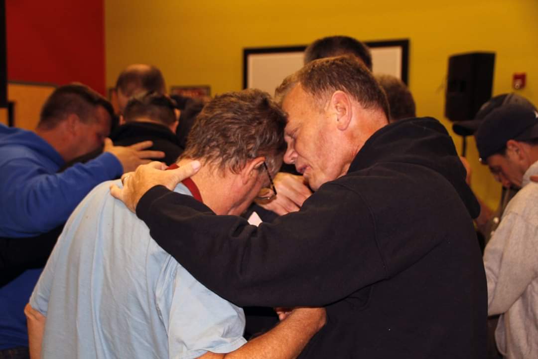 Prayer and embrace